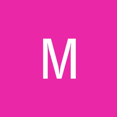 M.